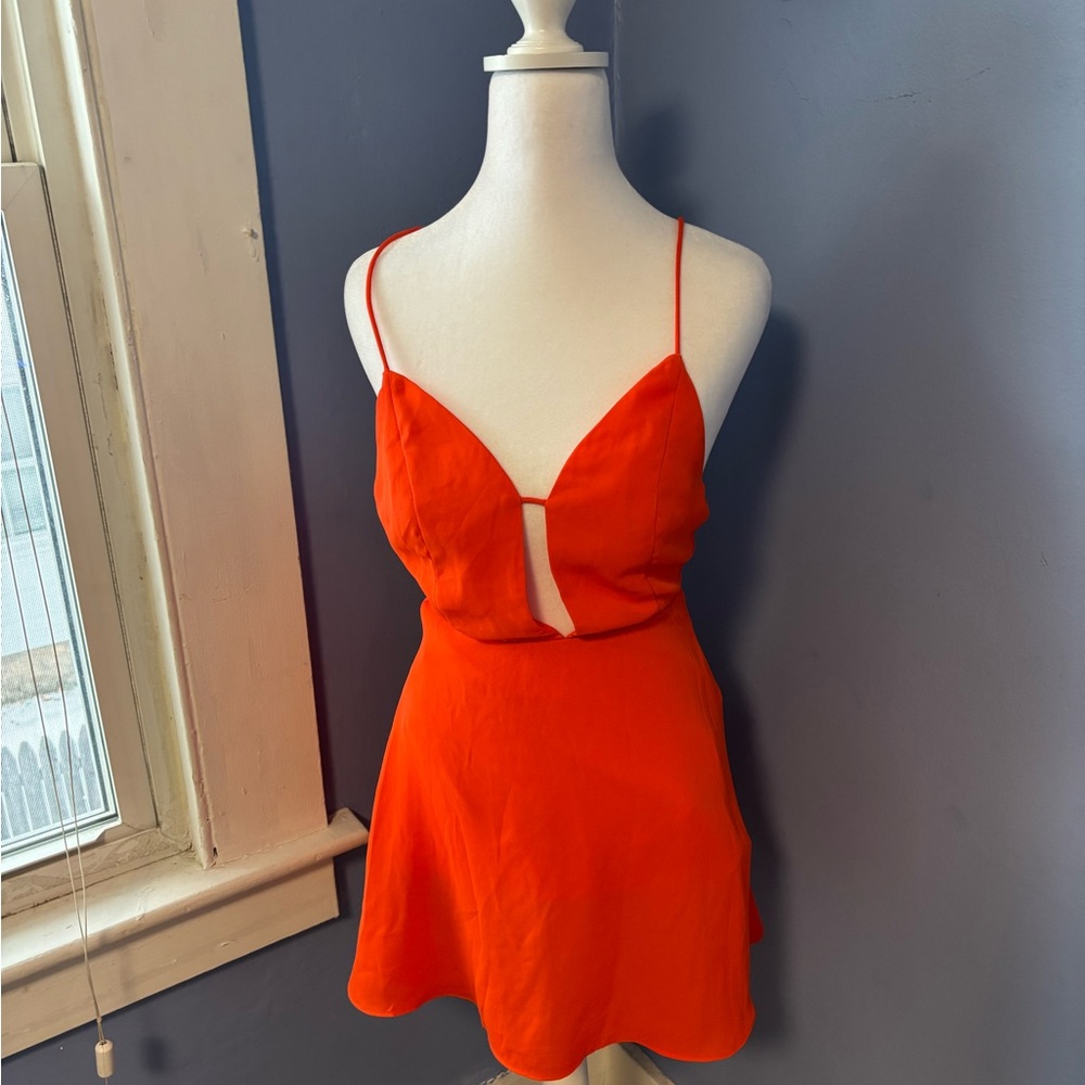 Vibrant Orange Mini Dress with Strappy Design